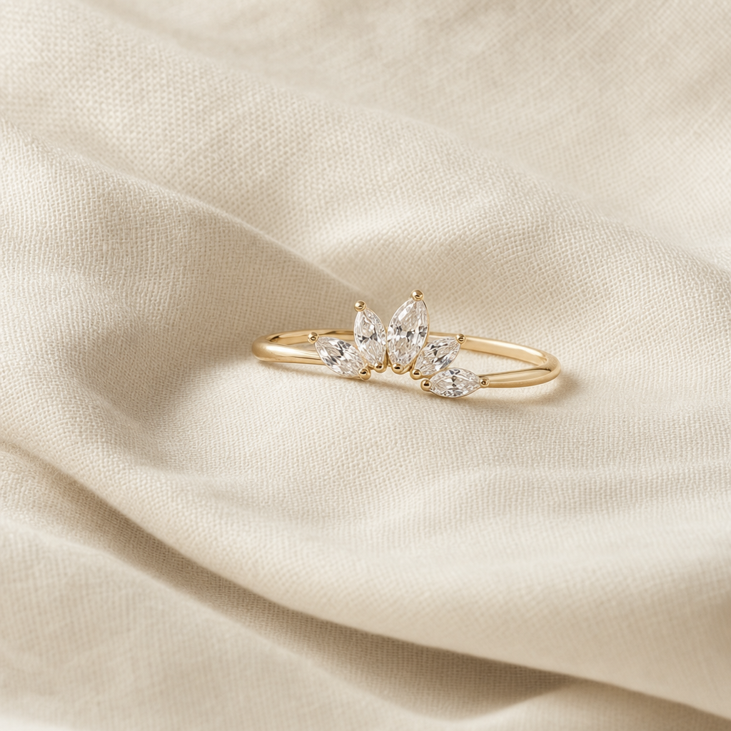Gold ring with marquise crystal cluster on linen