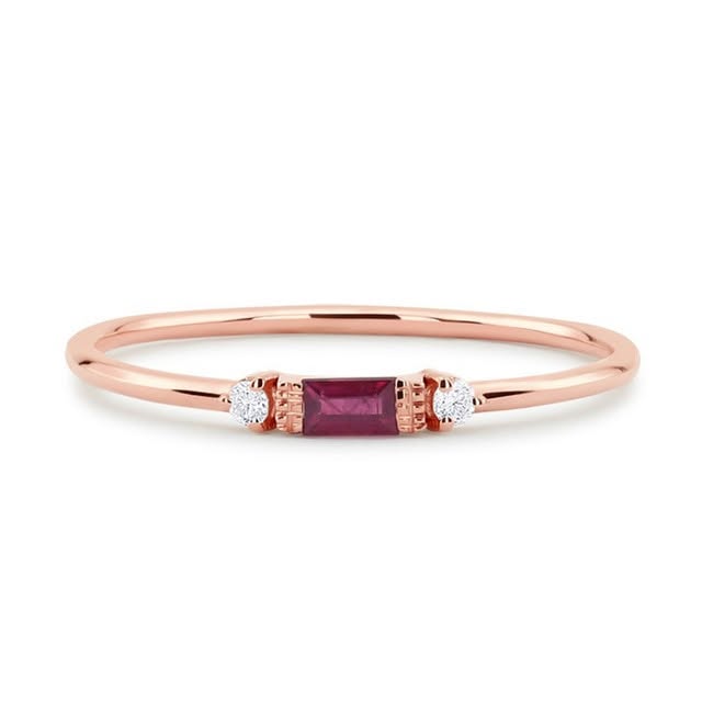 Rose gold ring with ruby baguette and diamond accents