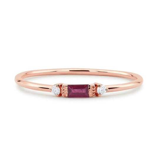 Rose gold ring with ruby baguette and diamond accents