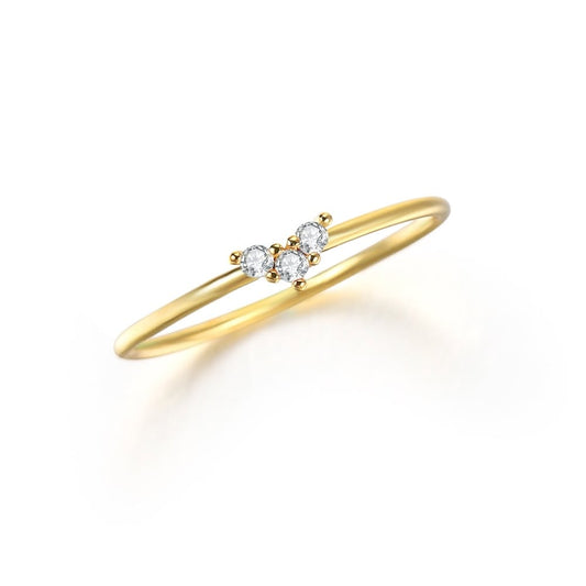 Yellow gold ring with three-stone diamond cluster