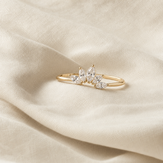 Gold ring with marquise crystal cluster on linen